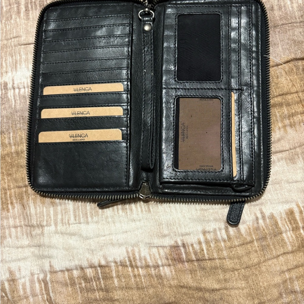 Chic Black Leather Wristlet with Intricate Design - Picture 3 of 5